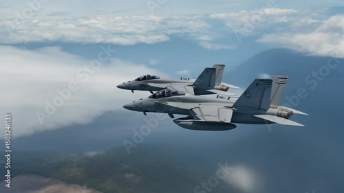 Two fighter jets in flight against a backdrop of cloudy skies and distant terrain.