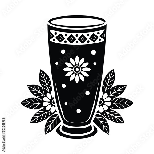 Silhouette of Indian thandai drink in glass with festive toppings and floral design on rim on white