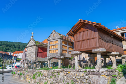 Iconic horreos and traditional architecture in Combarro, a charming Galician village in Pontevedra, Spain. The site dates back to the 12th century and is a symbol of cultural heritage. photo