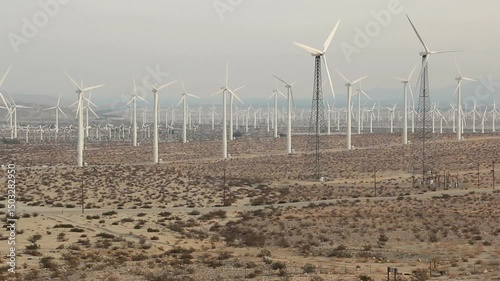 Green electricity renewable energy producing windmills in the California desert at the San Gorgonio Pass Wind Farm, located near route 10 in the San Gorgonio Pass in Riverside County.
