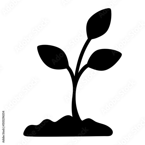 Silhouette of a small plant growing from soil representing new life