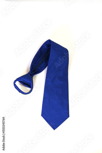 A blue tie folded isolated on white background  