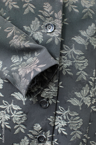 An Elegant Floral Patterned Fabric Shirt Detail that stands out and captures attention