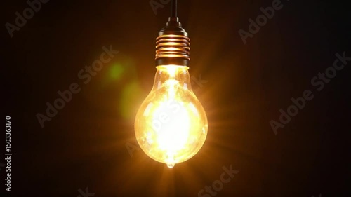 Classic Light Bulb Turning On and Off in Dark Space Close-Up in 4K