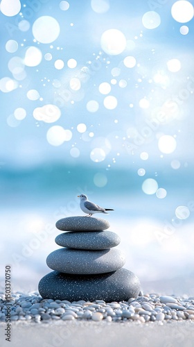 Serene Gray Pebbles Stack with Small Bird on a Soft Wave Beach