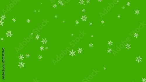 Falling snowflakes overlay on green background with alpha channel. Abstract turquoise snowflakes falling slowly from the sky. Christmas motion graphic video animation.