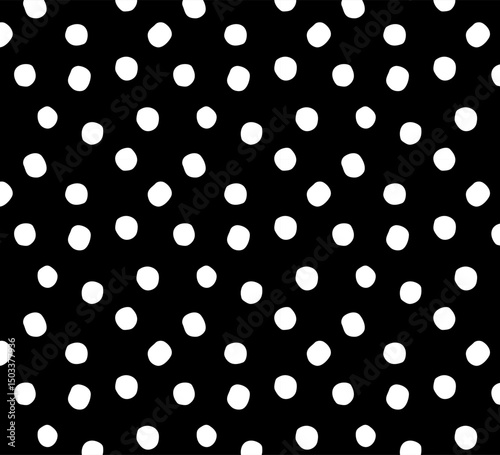 Seamless polka dot pattern with irregular white dots on a black background. Hand-drawn minimalist style, perfect for fabric, packaging, backgrounds, branding, wrapping paper, and modern design project