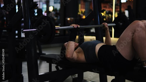 young man lifting weights