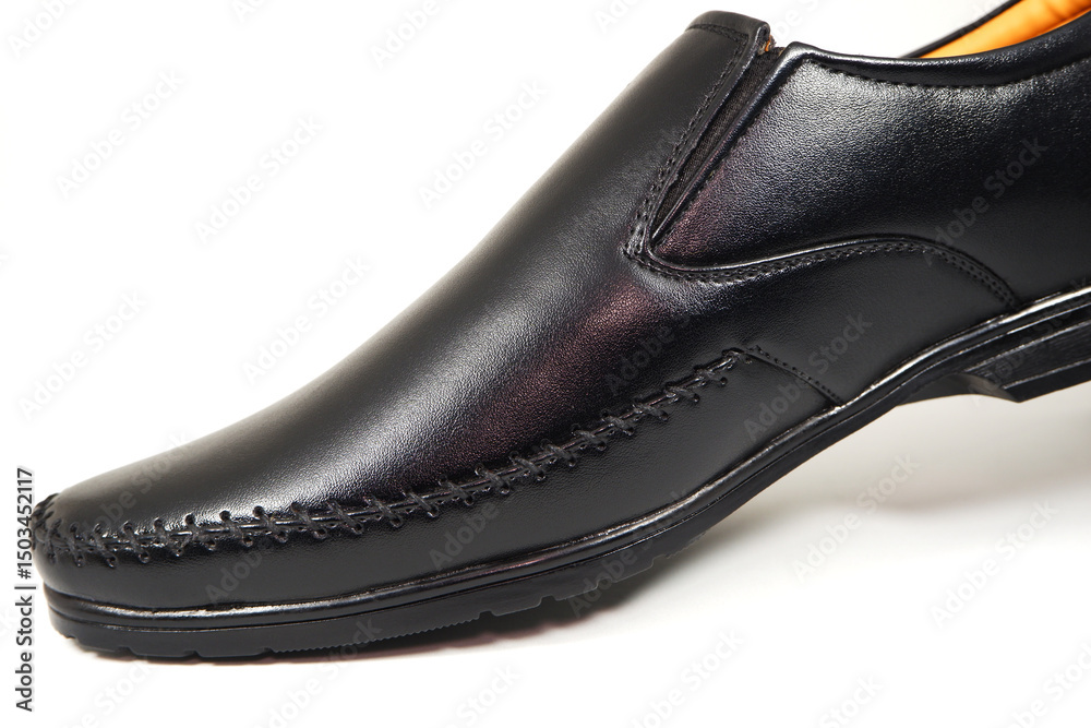 A formal black shoe isolated on white background closeup view A formal black shoe isolated on white background closeup view