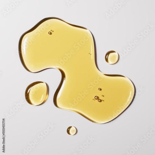 Golden liquid jojoba oil drops, olive oil texture abstract background, 3d rendering