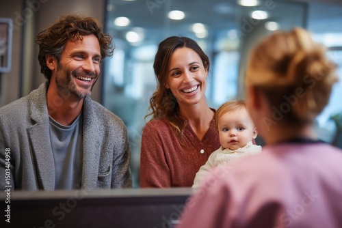 Happy man and woman with baby attending appointment with a professional. New family concept with infant for health care and finance content.
