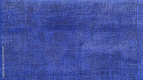 Blue Woven Texture Abstract Fabric Background with Indigo Linen Surface.