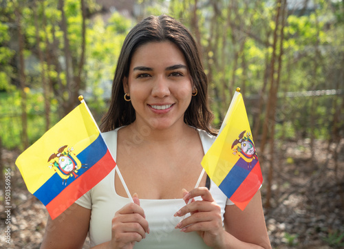 Ecuadorian woman in USA holding flags from her homeland