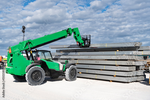 Miami, Florida, USA - November 16, 2024: Heavy equipment boom lifting machinery. Sunbelt Rentals Genia. Telescopic Boom Lift at construction. Sunbelt Rentals boom lift outdoor. Machine equipment.