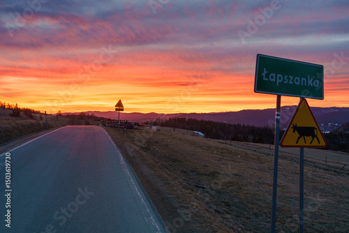 Fototapeta Naklejka Na Ścianę i Meble -  Road to Lapszanka village at sunrise. Tatry mountains region. Poland