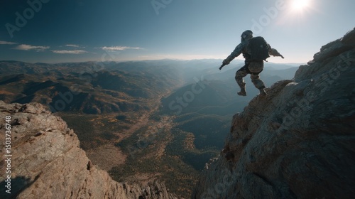 Extreme mountain pursuit: Soldier leaps across rocky precipice with scenic vista