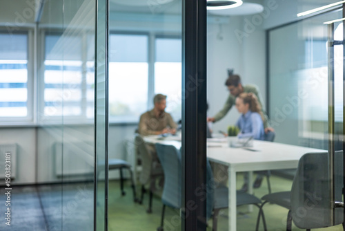 Business office with blurred people casual wear, with blurred bokeh background
