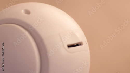 Close-up of a wireless surveillance camera, concept of smart devices for home security and protection