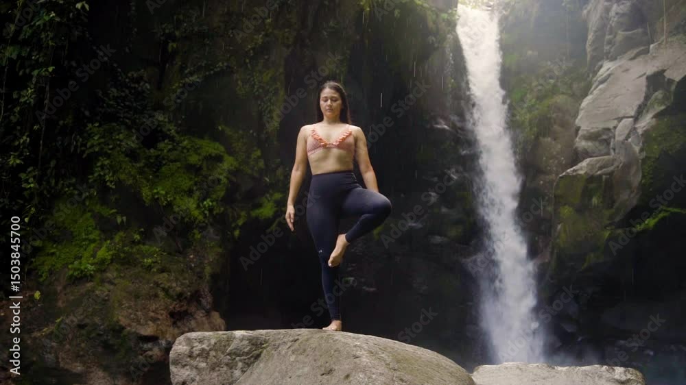Yoga in the tropical weathers of Costa Rica by the waterfall and rain Yoga in the tropical weathers of Costa Rica by the waterfall and rain