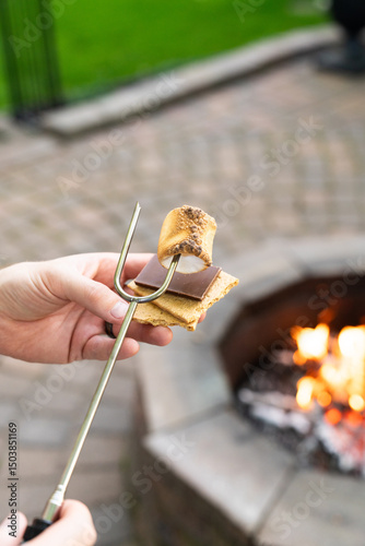 Creating the Perfect S'more by a Firepit