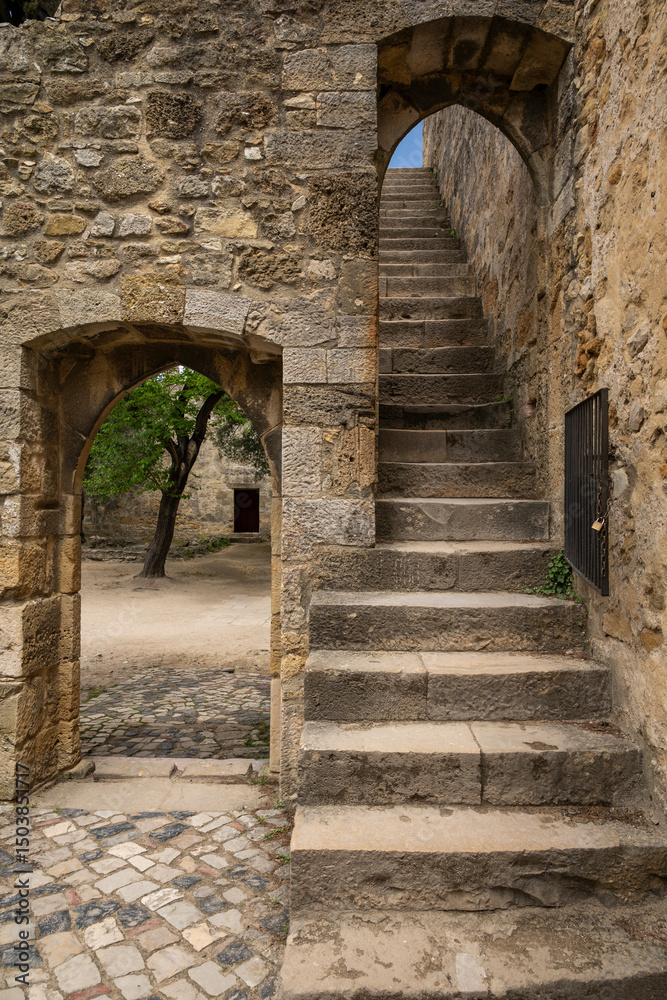 Beautiful view to old historic walls and staircase in São Jorge Castle Beautiful view to old historic walls and staircase in São Jorge Castle