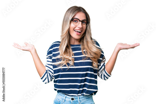 Photography Young Uruguayan woman over isolated background with shocked facial expression