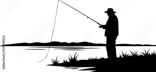 Silhouette of  elderly man fishing by the lake during sunset  