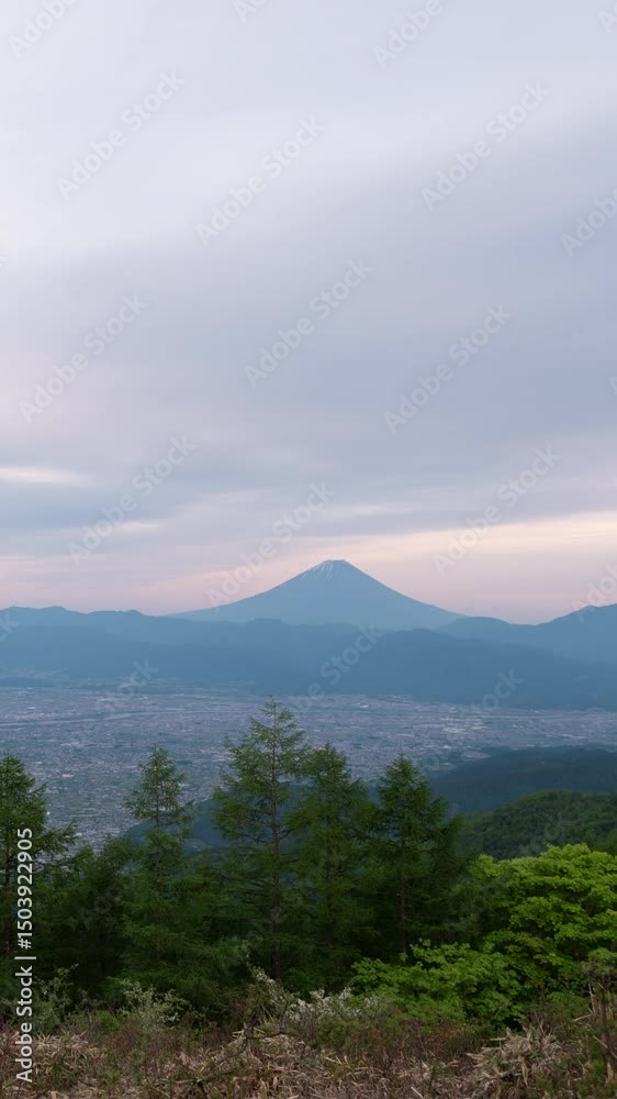 Mount Fuji over Cities in Kofu Basin (Vertical Day-to-Night Time Lapse): Captured from Mount Amari in Nirasaki City Mount Fuji over Cities in Kofu Basin (Vertical Day-to-Night Time Lapse): Captured from Mount Amari in Nirasaki City