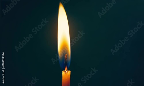Single candle flame close up