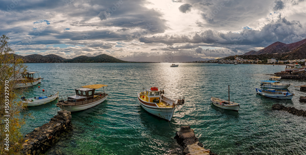 Boats floating gently in Schisma Elountas harbor Boats floating gently in Schisma Elountas harbor