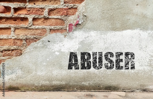 Gurnuge wall with text written ABUSER -  who treats another person in cruel, violent or abusive way - intentionally uses mental, emotional, physical abuse resulting in serious harm