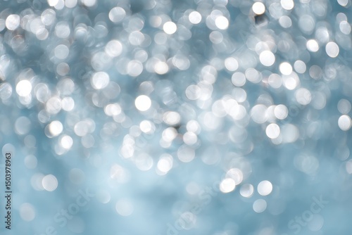 Abstract Blue Bokeh Background with Bright White Lights, Ideal for Festive Designs and Winter Themes