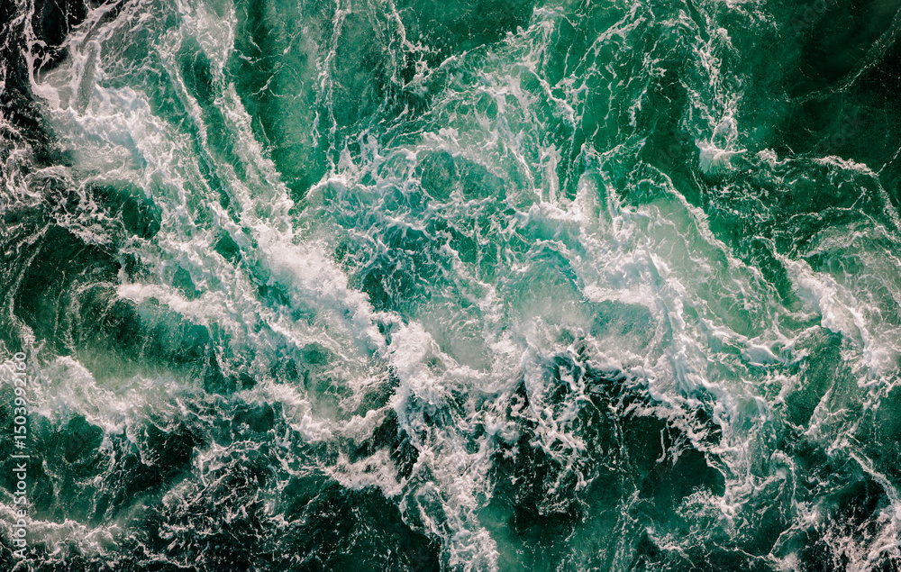 Fototapeta premium Blue waves of water of the river and the sea meet each other during high tide and low tide.