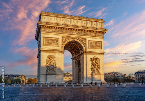Bild auf Leinwand Triumphal arch (Arc de Triomphe) on Charles de Gaulle square at sunrise, Paris,