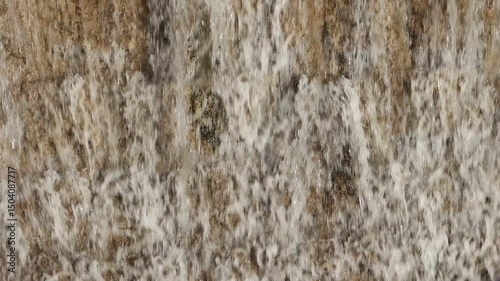 Water flowing on the dam wall