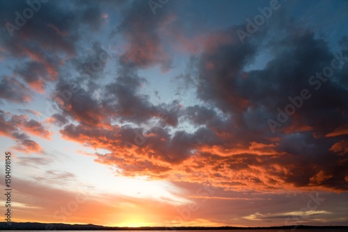 Dramatic Red Sunset Sky over Pt Chevalier Beach photo