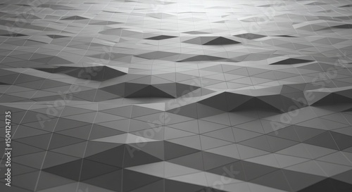 Abstract gray triangular surface with subtle light and shadow variations, creating a modern geometric pattern.