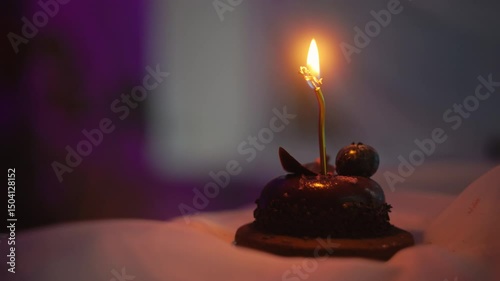 Wallpaper Mural An Elegant Chocolate Cake with Beautiful Candle Glow, captured in stunning 4K Ideal for all Celebrations Torontodigital.ca