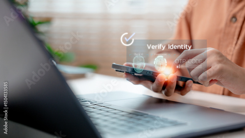 User verifying identity via smartphone using fingerprint, Face ID, or OTP code, representing secure digital authentication, online transaction safety, and fintech identity verification.