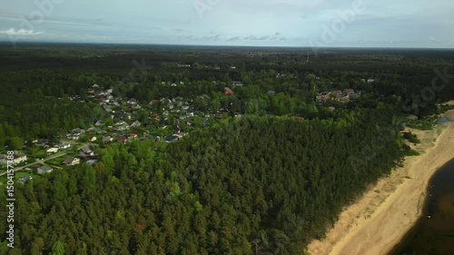 Wallpaper Mural Discover breathtaking aerial views that showcase the lush greenery of the forest and the serene, tranquil shoreline Torontodigital.ca