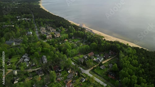 Wallpaper Mural An Aerial Establishing Shot Showcasing a Serene Lakeside Community Surrounded by Lush Greenery and Nature Torontodigital.ca