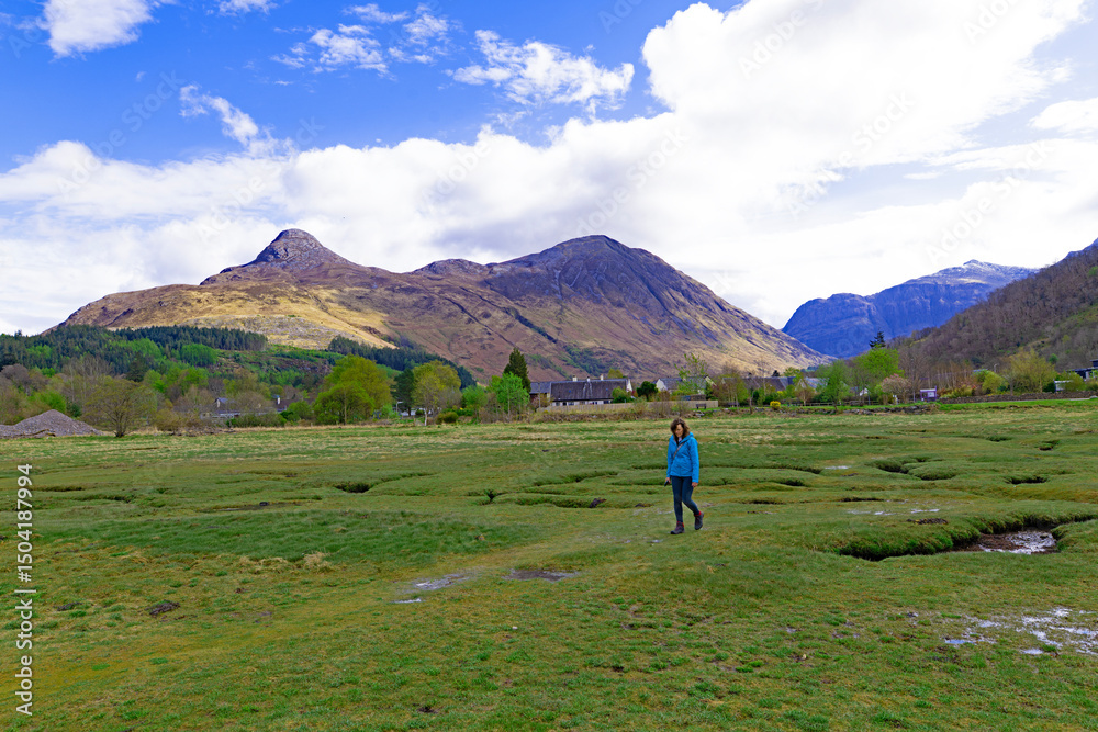 Fototapeta premium Walking carefully across the plains where Loch Leven recedes into the sea.