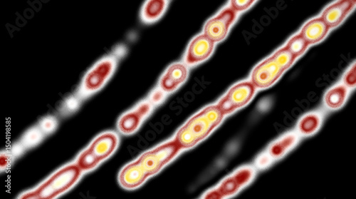 Abstract lines of light, red and yellow, on black background