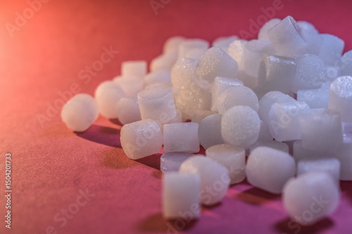 macro view of camphor pill on red background. camphor isolated view. use for clean environment, healthcare, worship and praying. To cure illness.