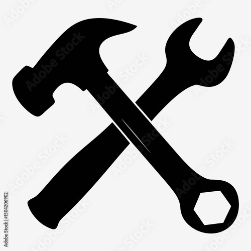 Maintenance Tools: a classic emblem with the silhouette of a hammer and wrench, a stark representation of industrial tools. 