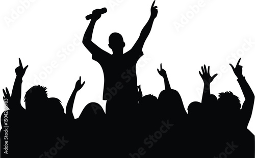 Silhouette of a happy people crowd dancing with joy at a music party