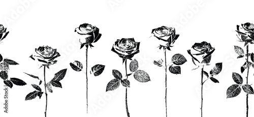 Seamless pattern of upright black and white roses with stems — repetitive ink-stamp design for elegant vintage decor. The design emulates an ink-stamp style, showcasing intricate petal textures.