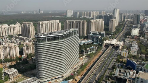 Drone Shot of DLF Golf Course Road Gurgaon – Aerial View of Luxury High-Rises, Modern Infrastructure, Green Spaces, and Premium Real Estate in Gurugram, India