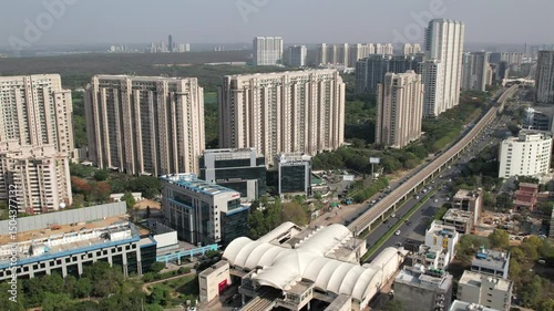 Drone Shot of DLF Golf Course Road Gurgaon – Aerial View of Luxury High-Rises, Modern Infrastructure, Green Spaces, and Premium Real Estate in Gurugram, India