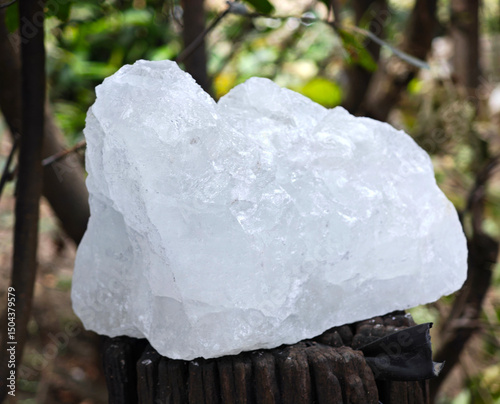 White alum cubes on wooden